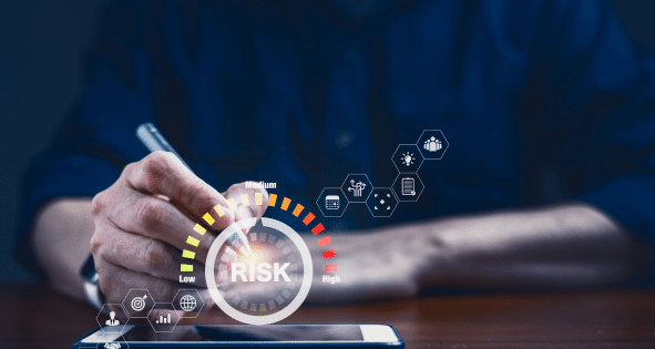 A graphic of a meter labeled “risk” to represent risk management.