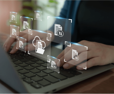 Several digital document symbols hovering over a laptop to represent a digital database of document files.